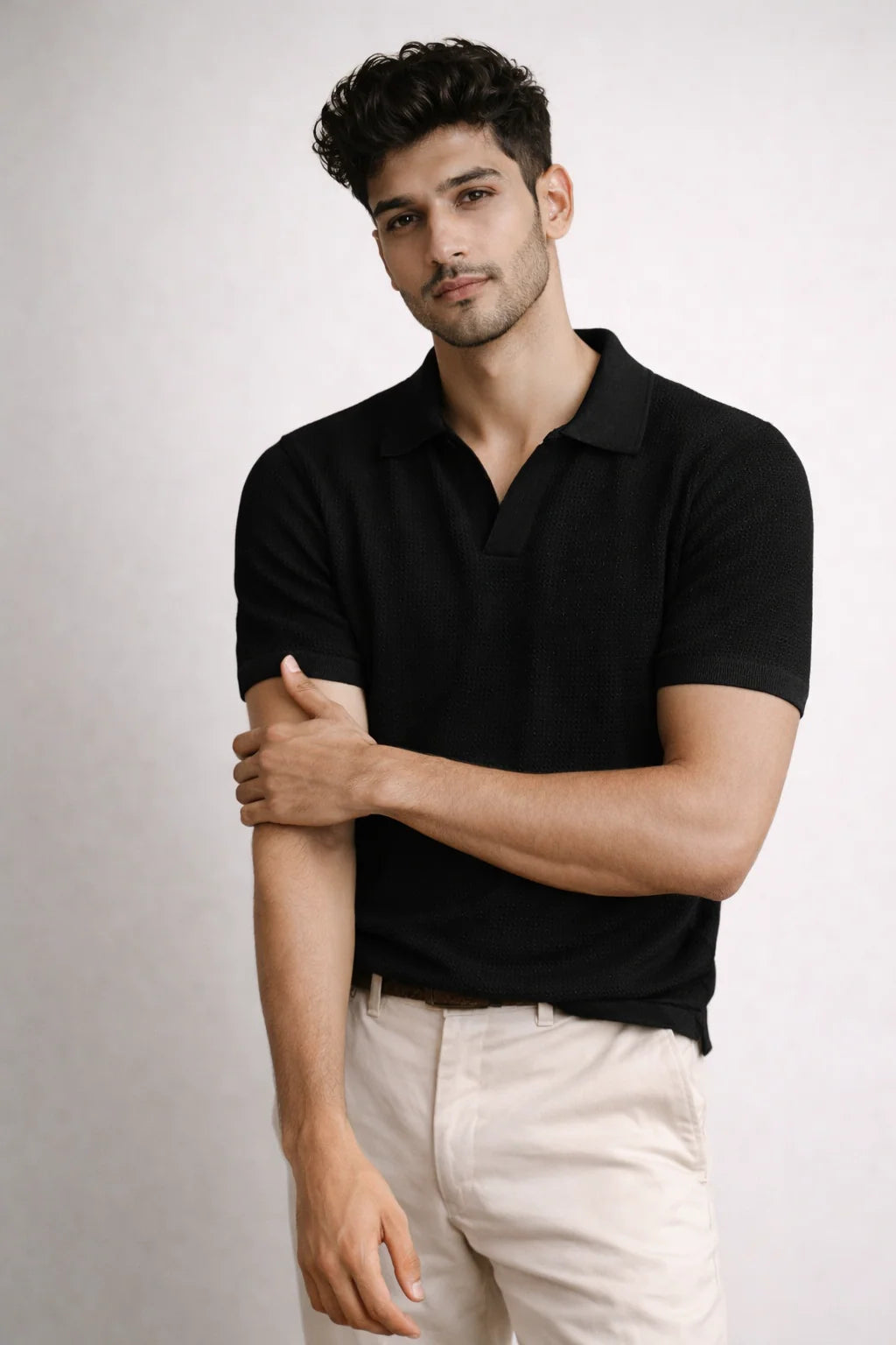 Black knitted polo shirt for men in Pakistan stylish casual wear